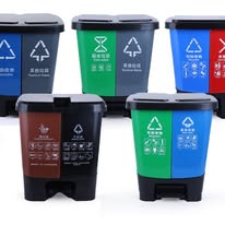 dual-compartment plastic recycling step bins designed for dry and wet waste separation.