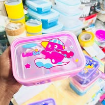 Pink bento-style cartoon character lunch box