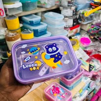 Pink bento-style cartoon character lunch box