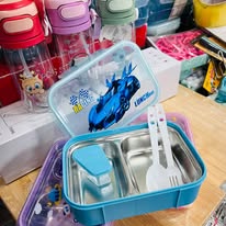 Pink bento-style cartoon character lunch box